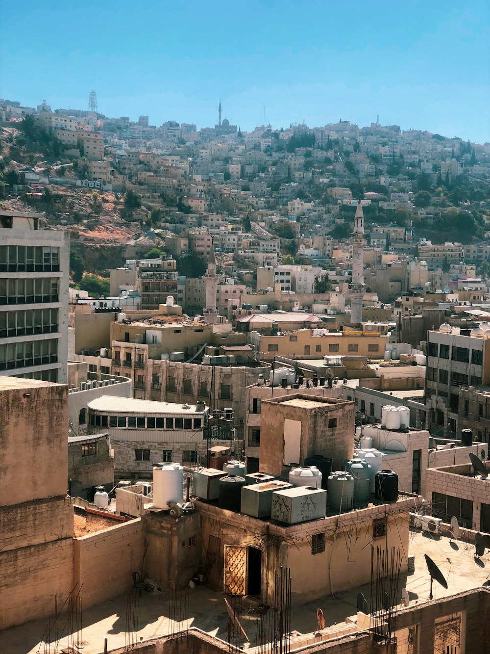 brown and grey concrete buildings during daytime