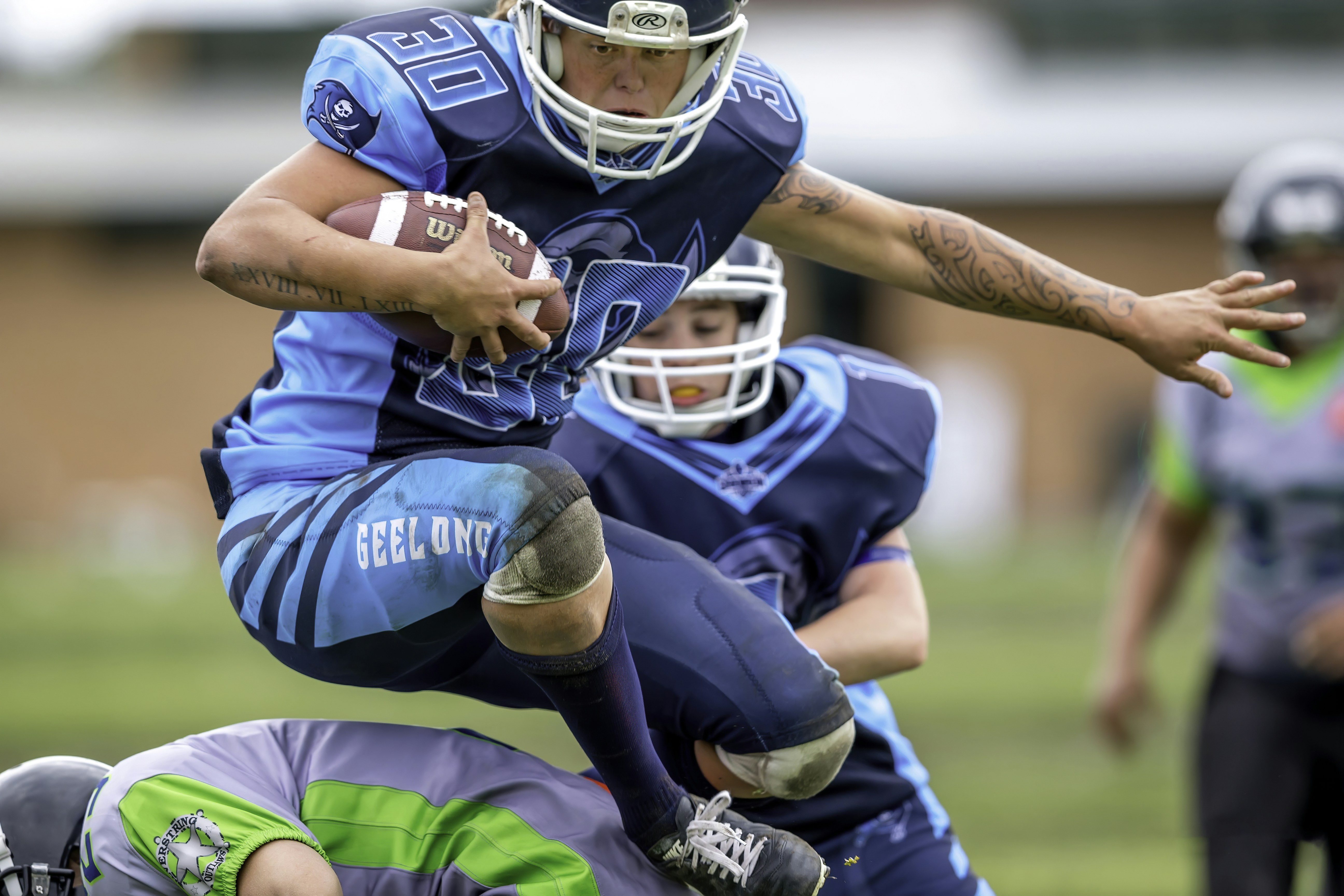 group of man playing soccer