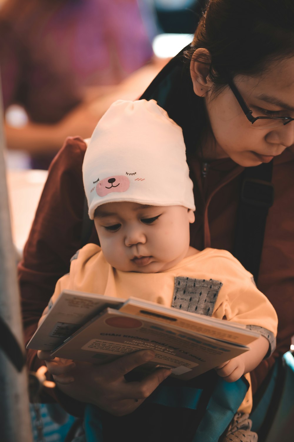 woman holding baby