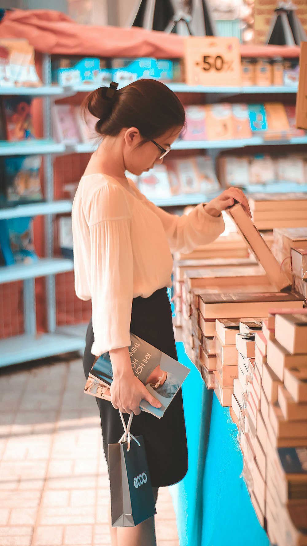 woman holding book