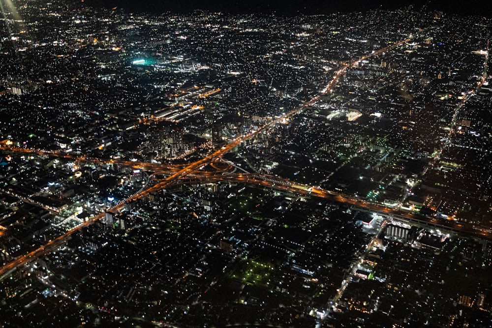 an aerial view of a city at night