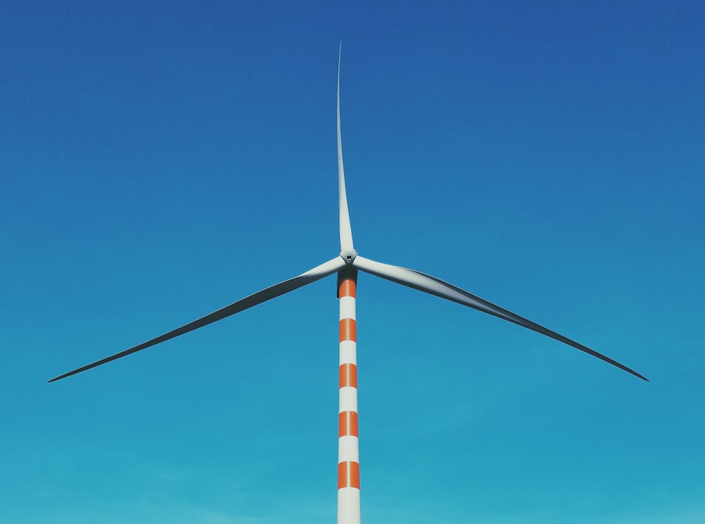 gray and orange wind turbine