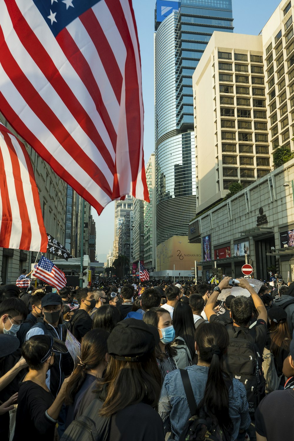 people near buildings during day