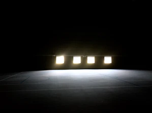 Luxurious basketball court close-up with polished wooden floor and vibrant lighting