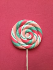 green-red-beige-and-white lollipop