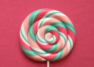 green-red-beige-and-white lollipop