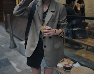woman wearing brown trench coat