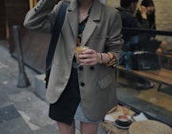 woman wearing brown trench coat