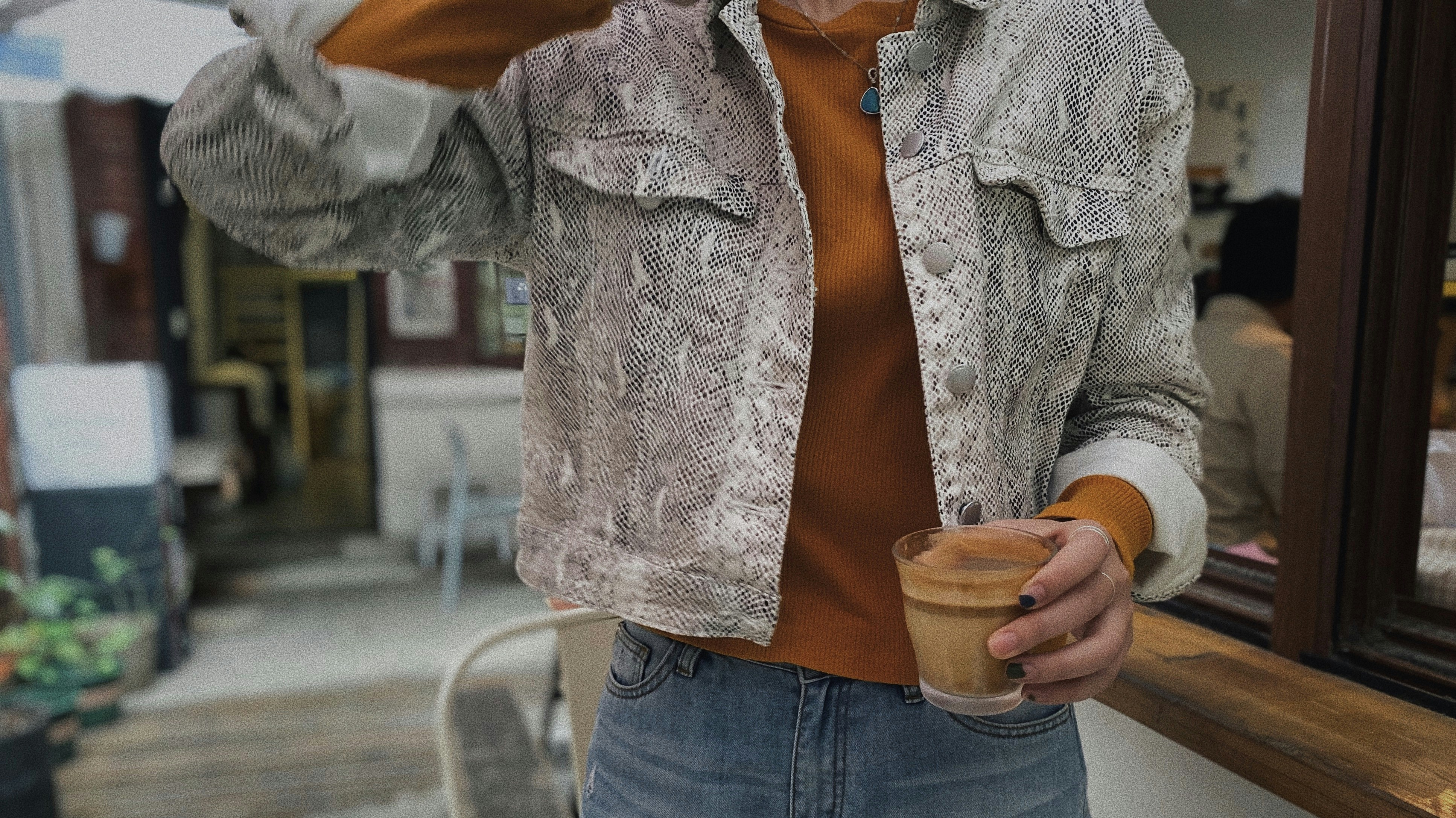 man wearing grey button-up jacket