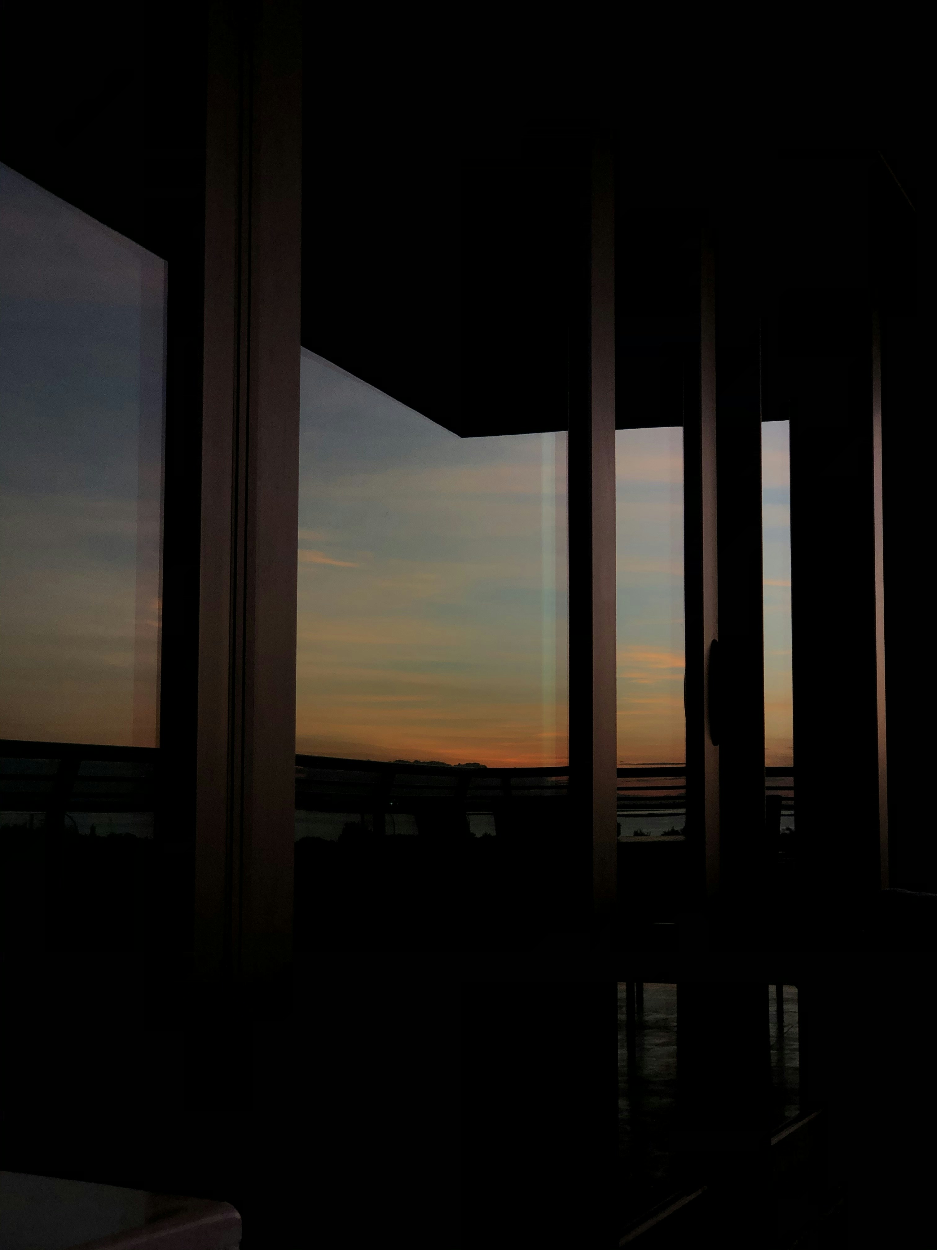 Reflected sunset on window