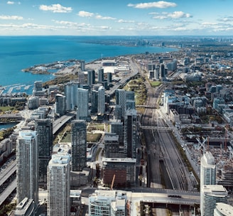 An aerial view of a bustling city showcasing various industries and developments.