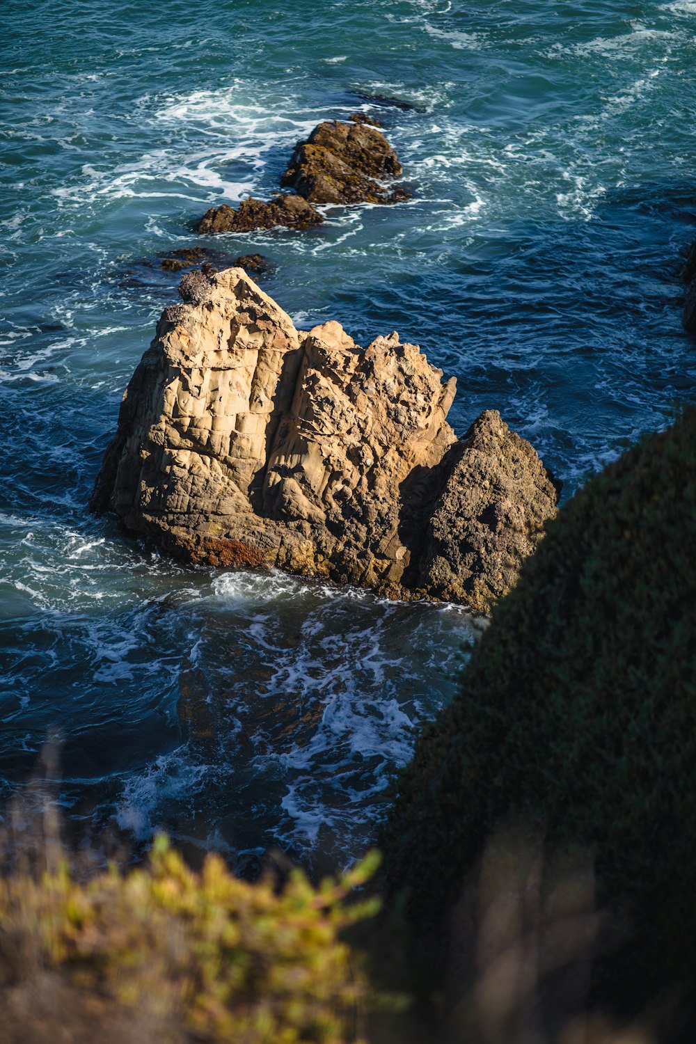 brown rocks on water