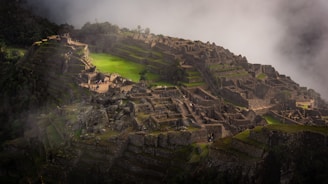 Ruins of an ancient settlement nestled in the mountains.