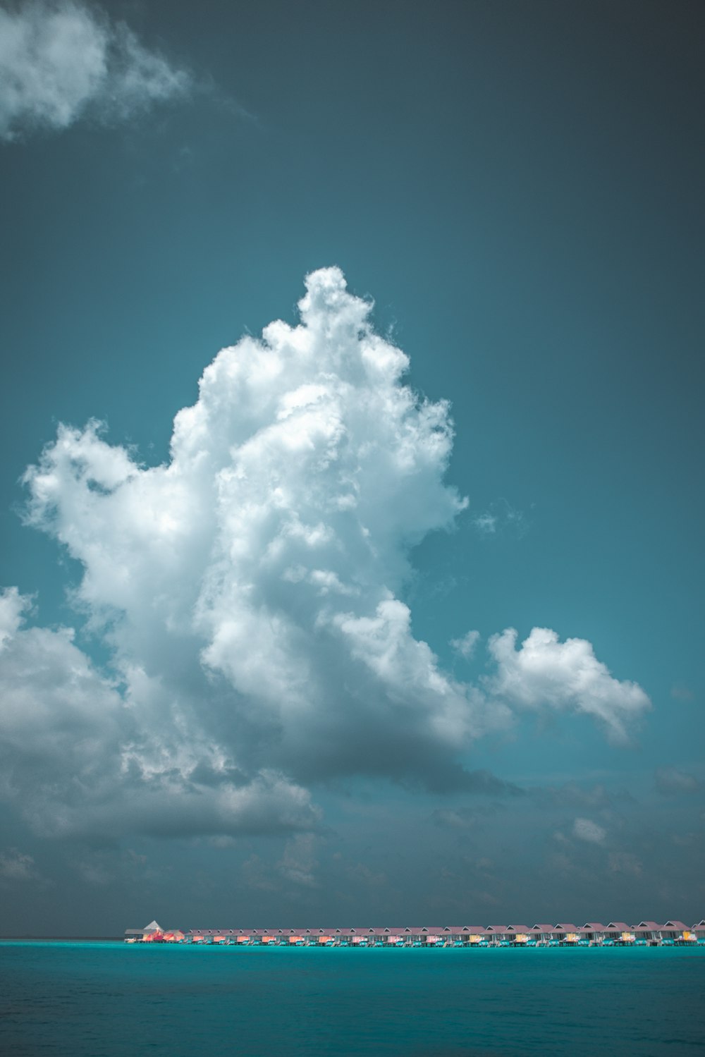 white clouds and blue ocean scnery