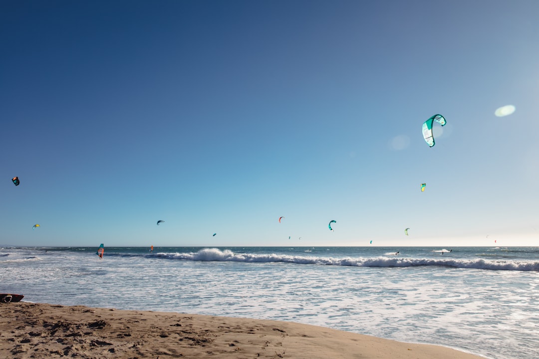 people wake boarding on sea