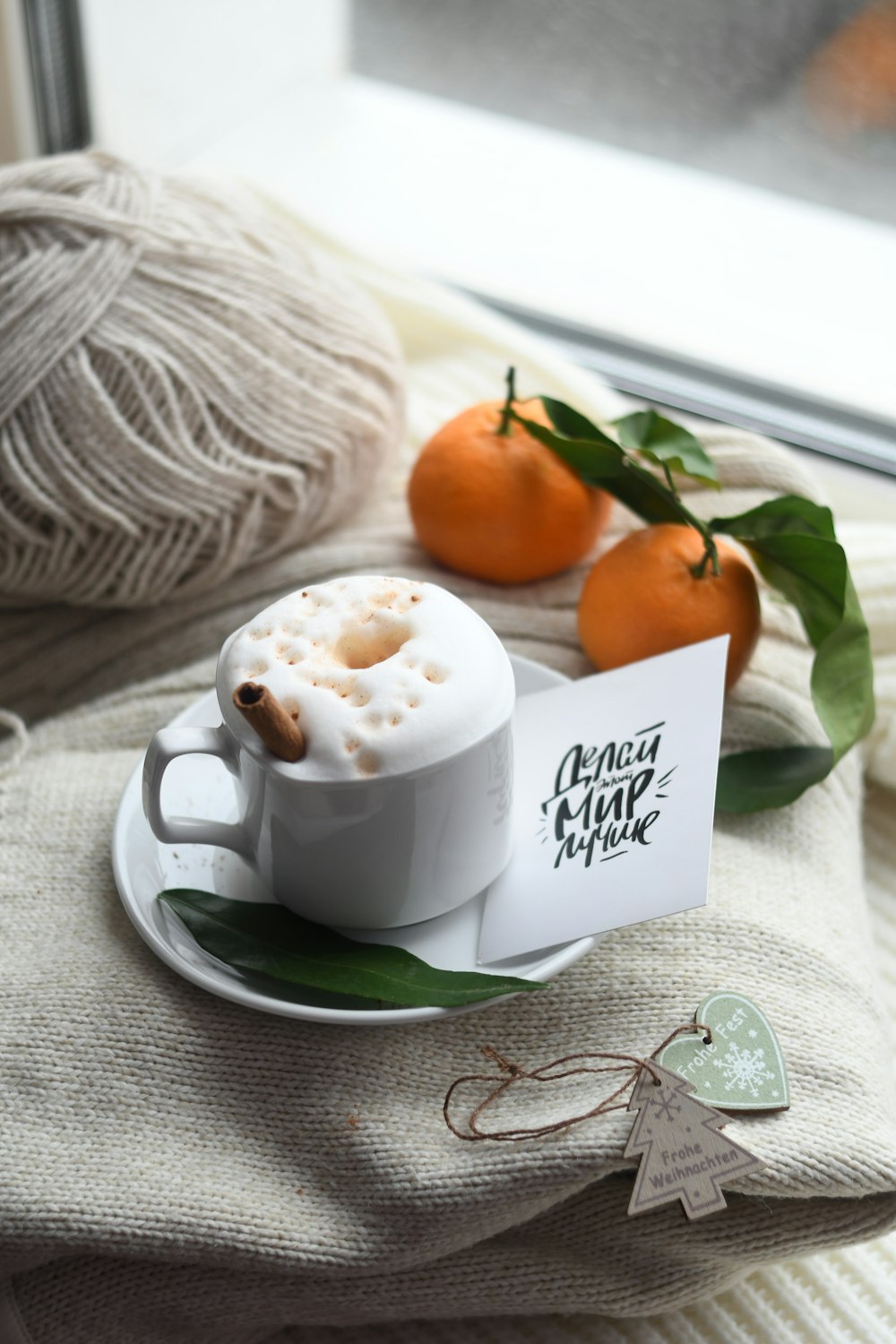 cup of beverage on saucer