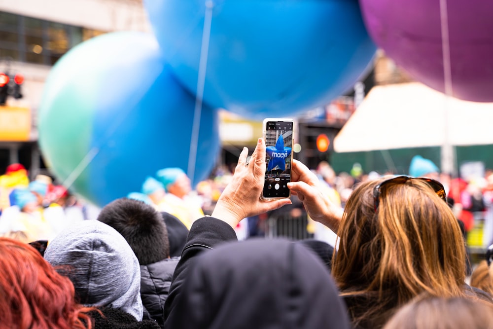 person holding Android smartphone