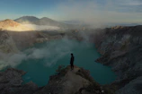 person standing on cliff