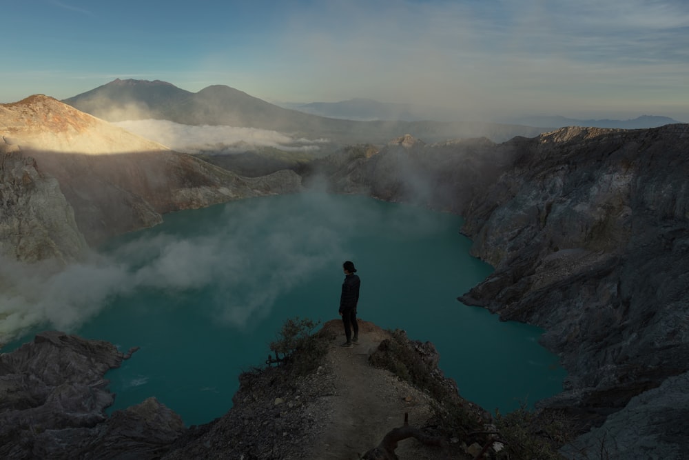 person standing on cliff