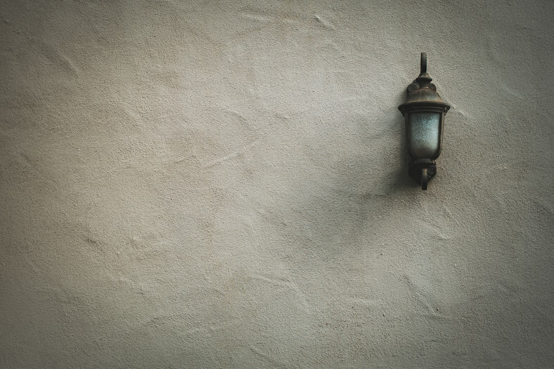 brown and white sconce lamp