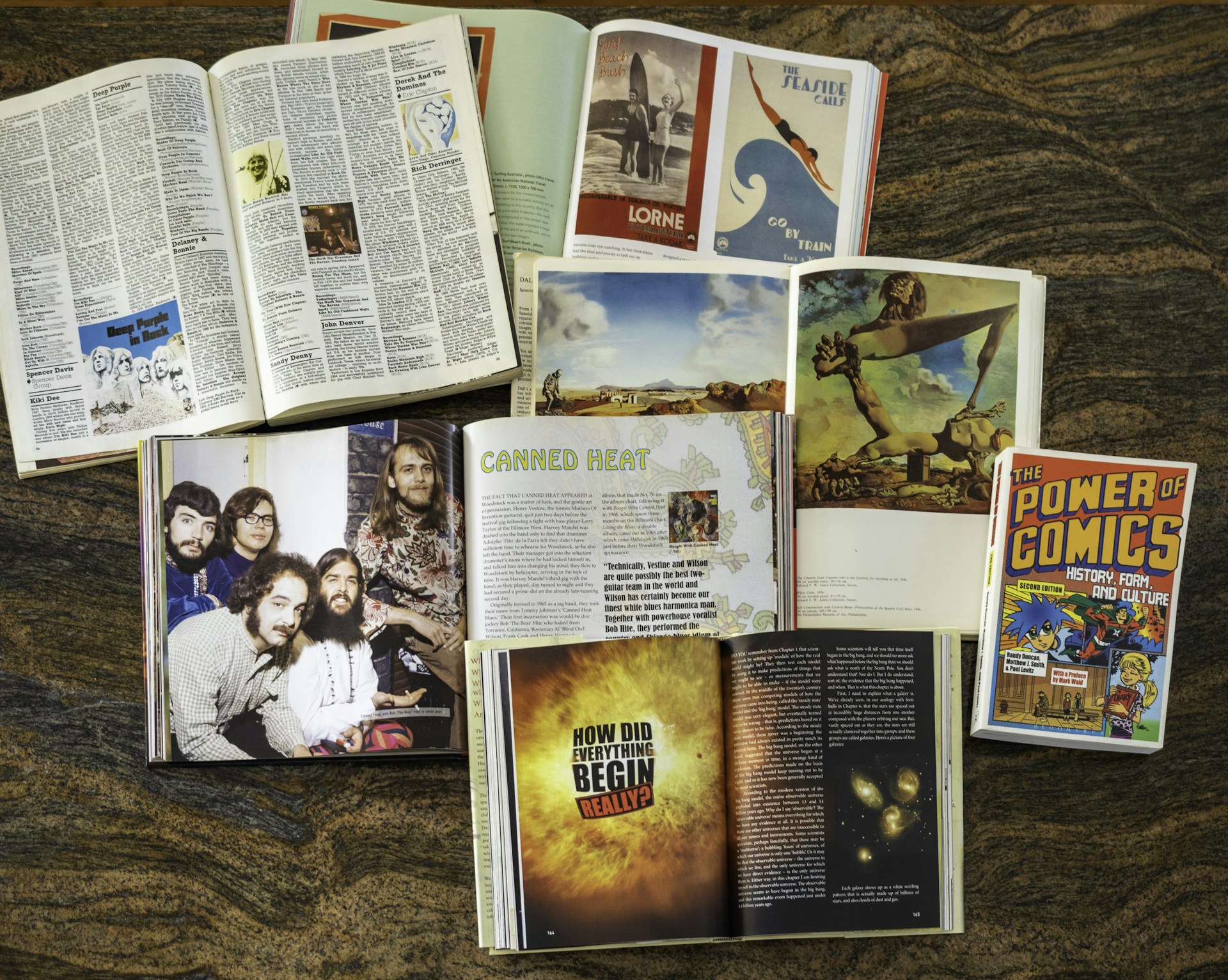 assorted book lot on brown surface