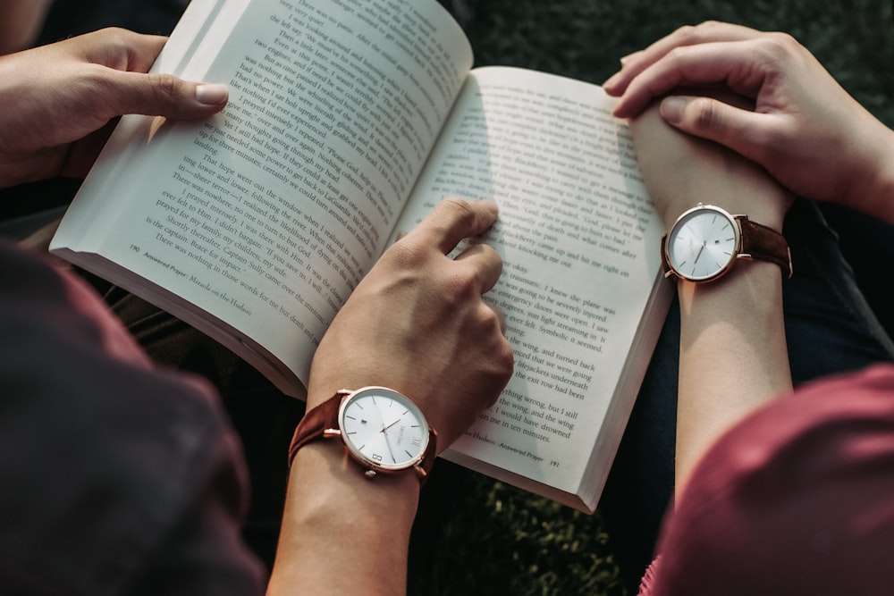 two people reading book