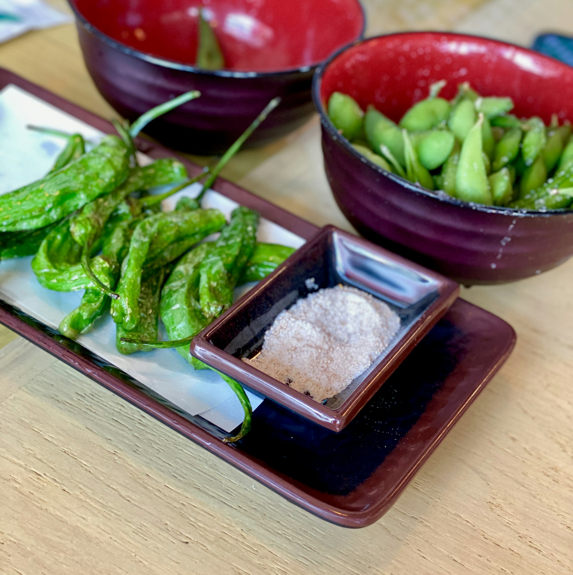 Edamame beans on a sushi type dish