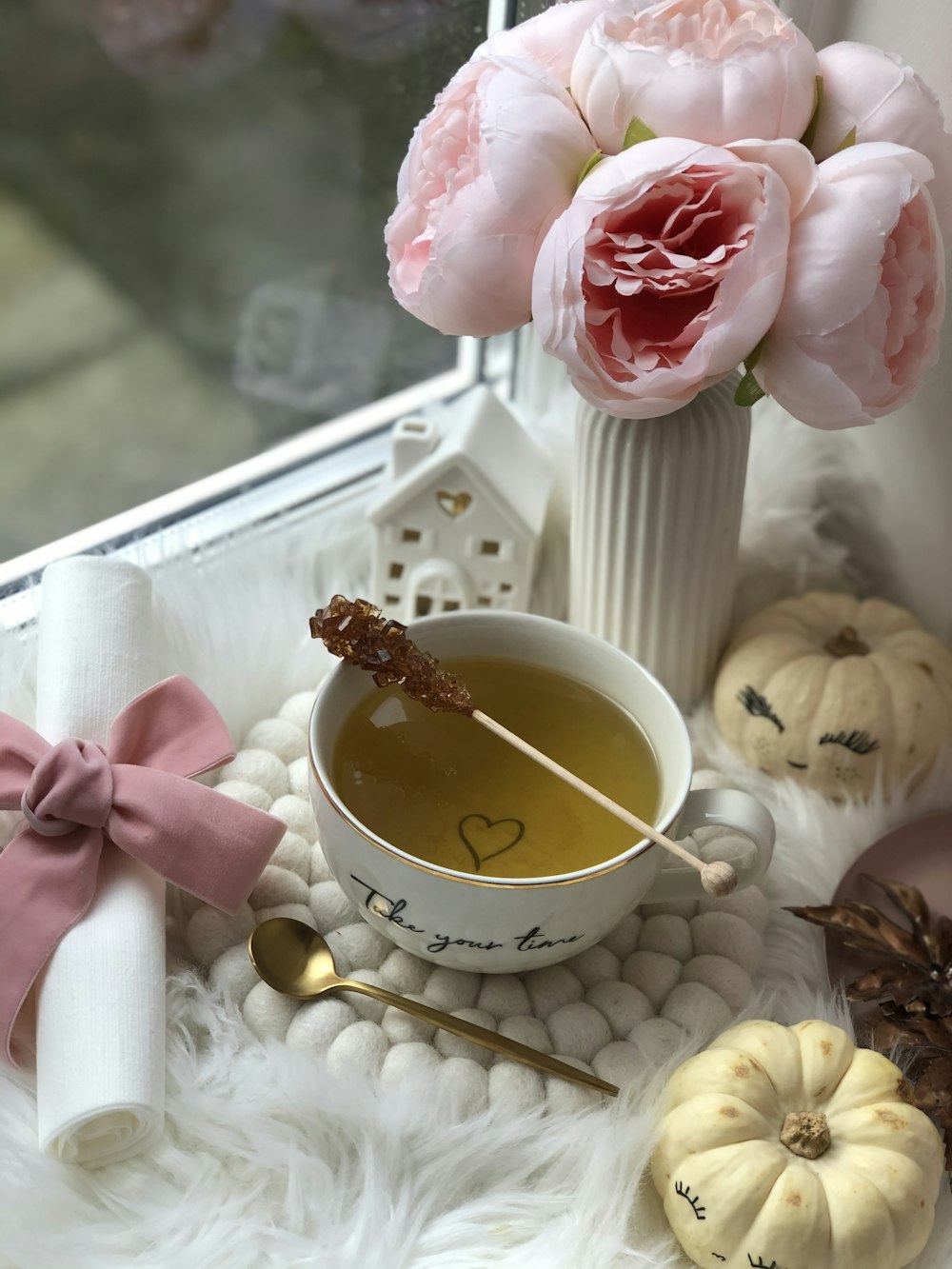 white ceramic coffee cup with liquid