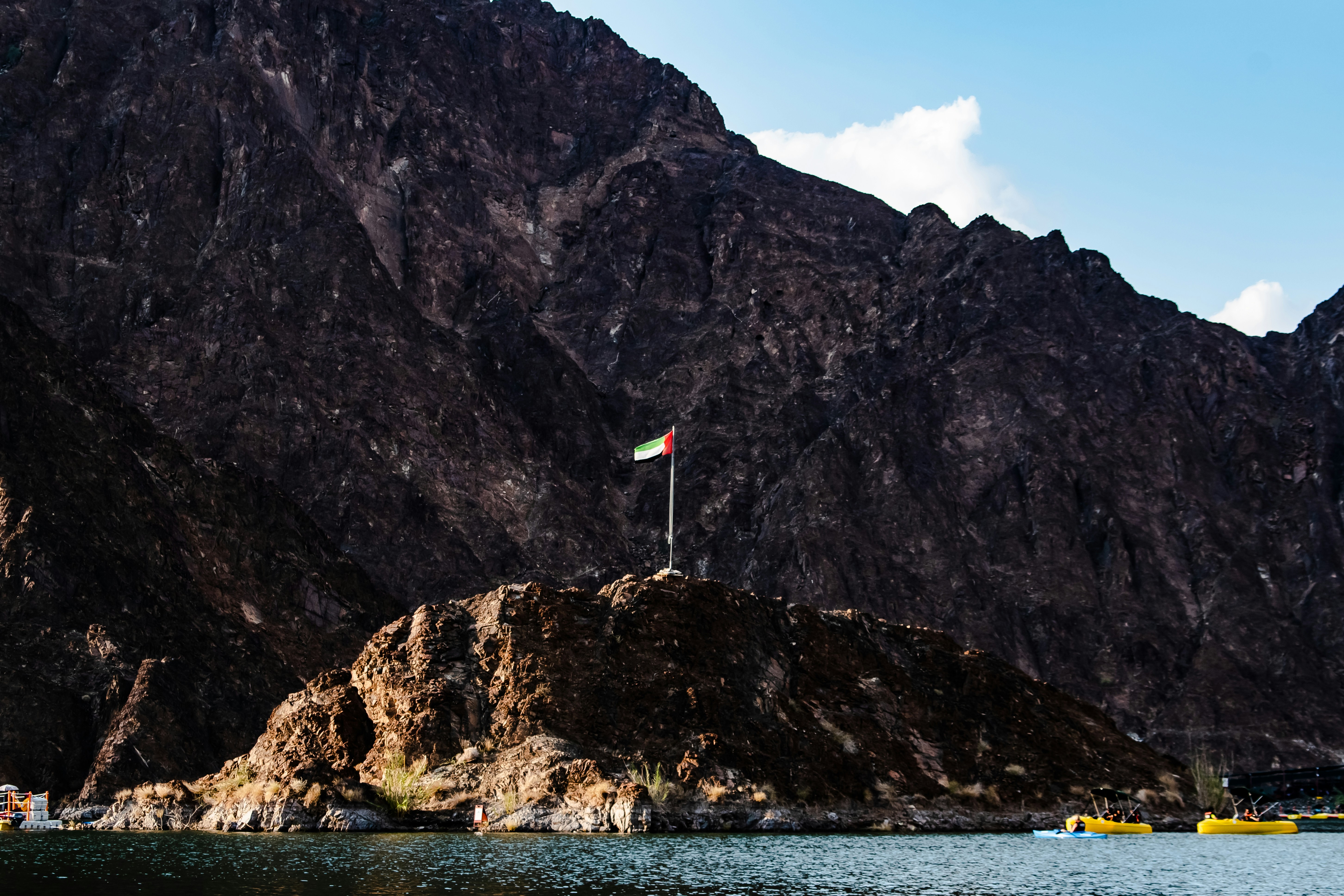 Hatta, UAE - UAE Flag in the middle of the Hatta Dam in Dubai. #dubai #uae