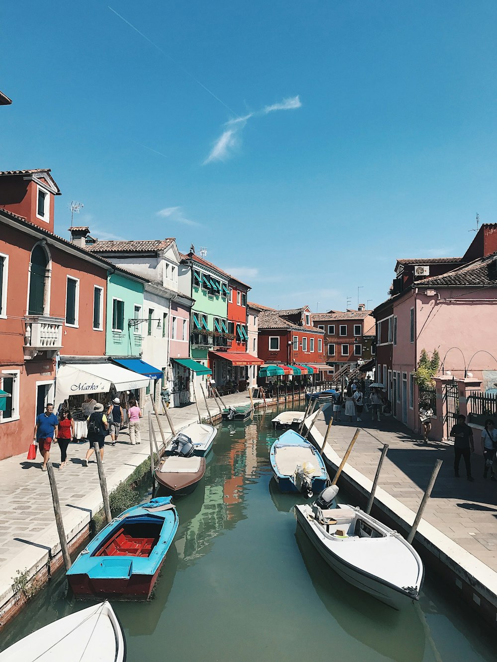 boats docked on street