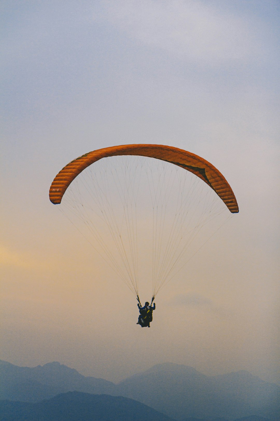 people parasailing midair
