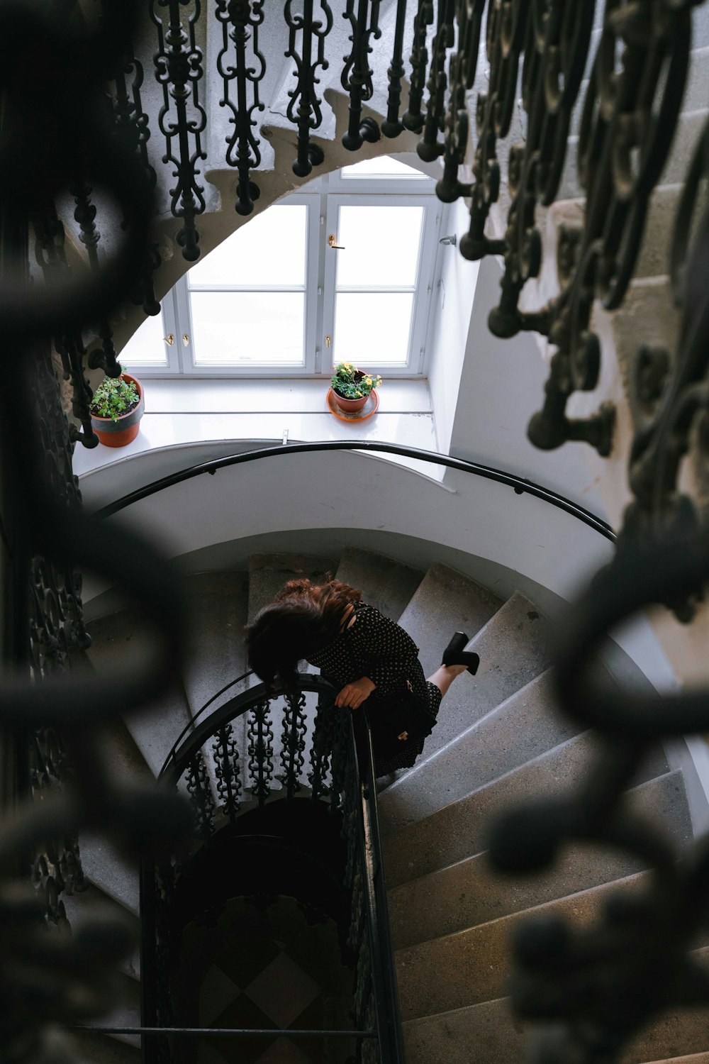 woman standing on stairs