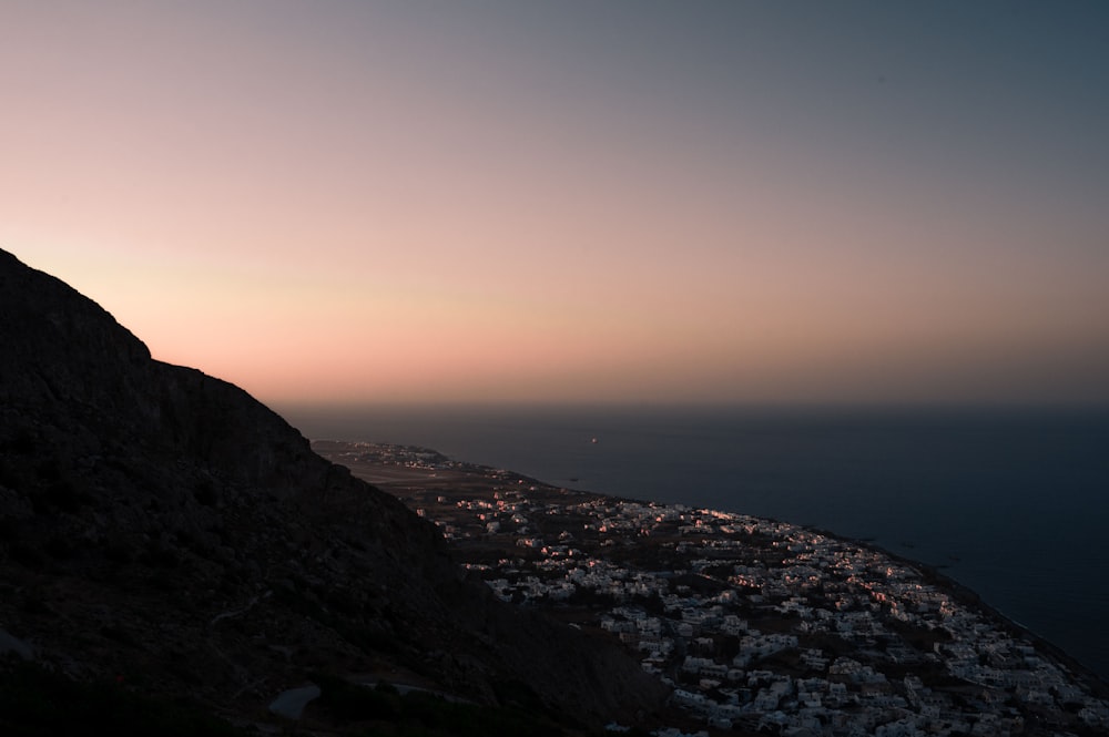 a view of a city from the top of a hill