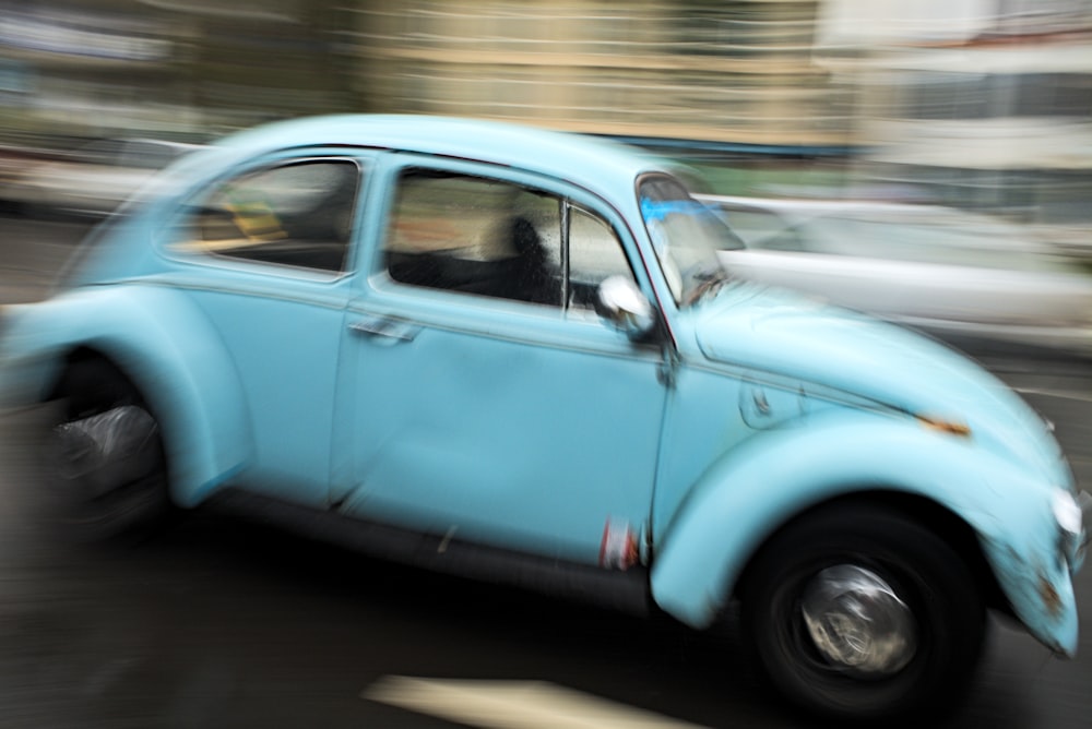 blue Volkswagen bettle