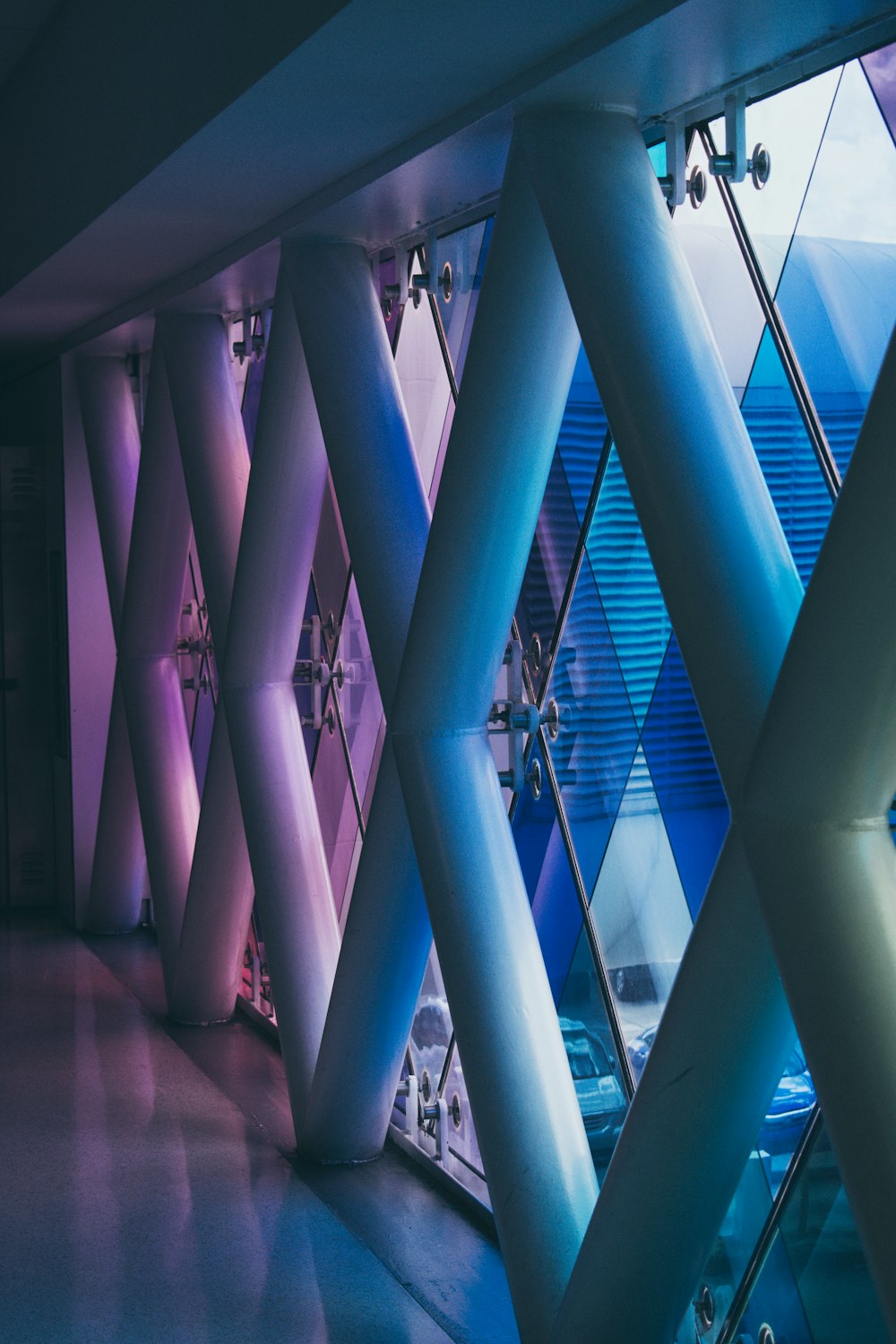 white and blue glass walled building