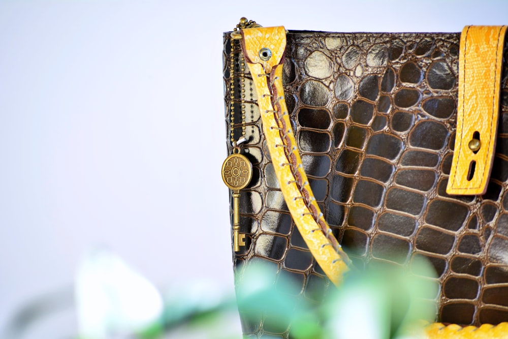 black and brown crocodile print leather tote bag