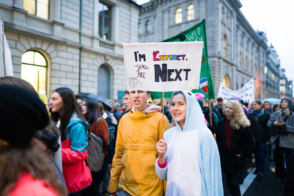 men and women doing rally in the street