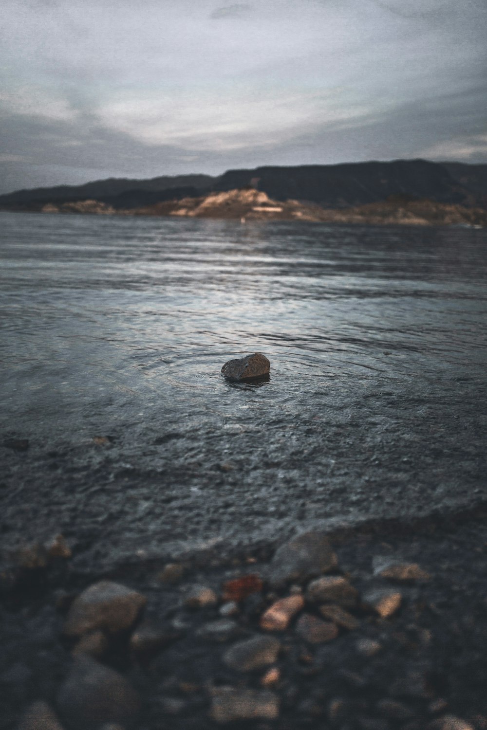 rock on seashore during daytime