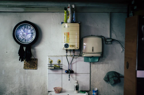 water heater on wall above sink
