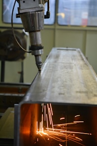 gray and black welding machine