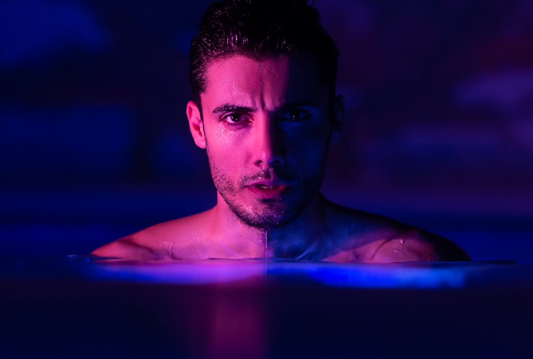 topless man top body of water, The Lights that change everything