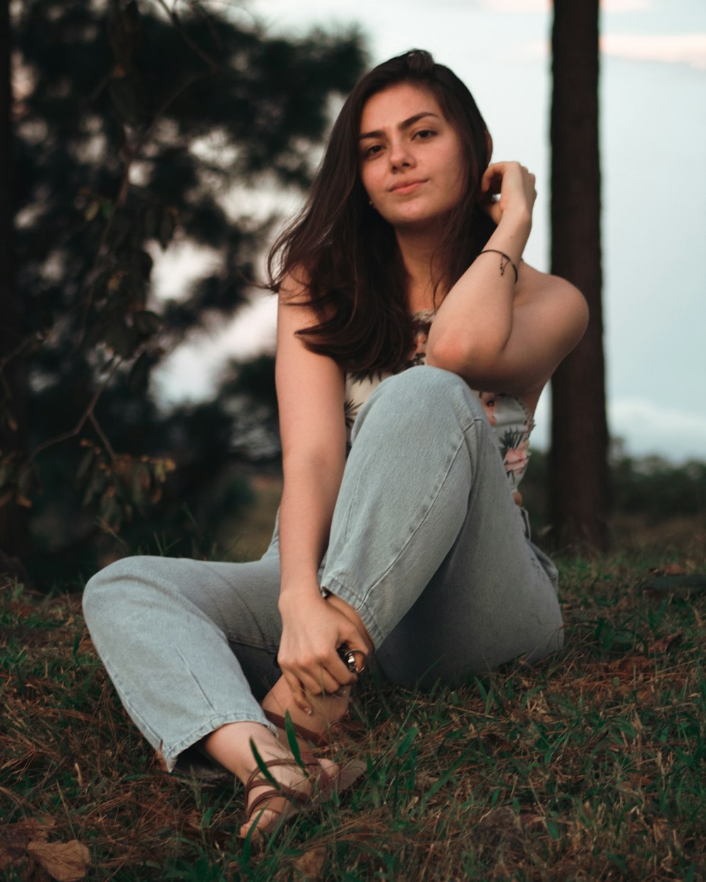 woman sitting on field