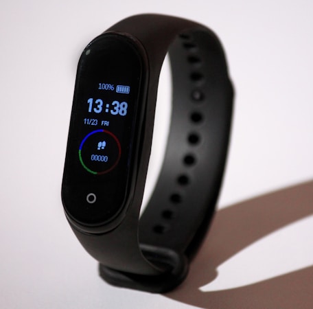 Fitness tracker wearable device on wrist representing Google Fitbit Air screenless health tracker launched May 2026 with AI health features