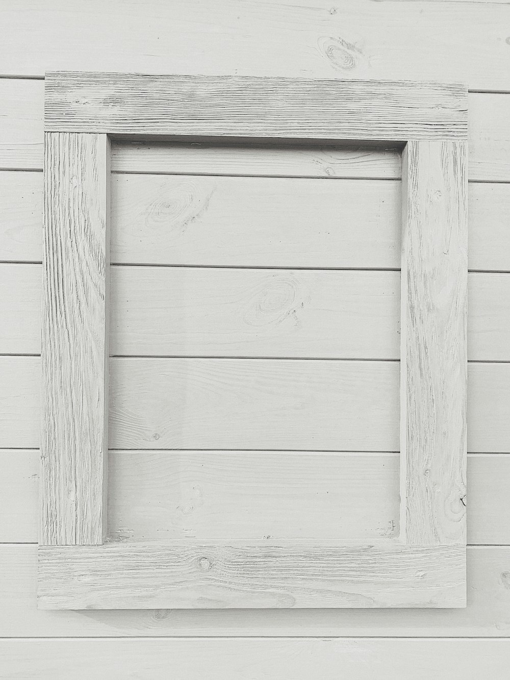 rectangular white frame on white surface