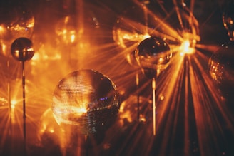 a group of disco balls sitting next to each other