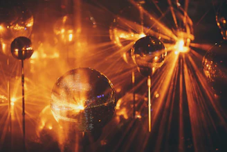a group of disco balls sitting next to each other
