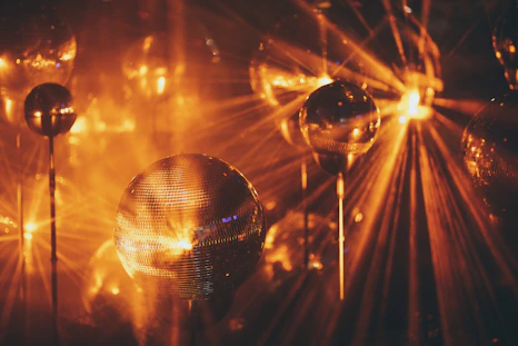 a group of disco balls sitting next to each other
