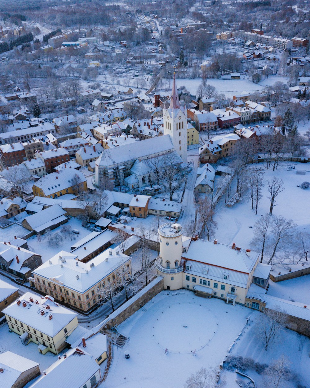 aerial photography of a city covered with snow