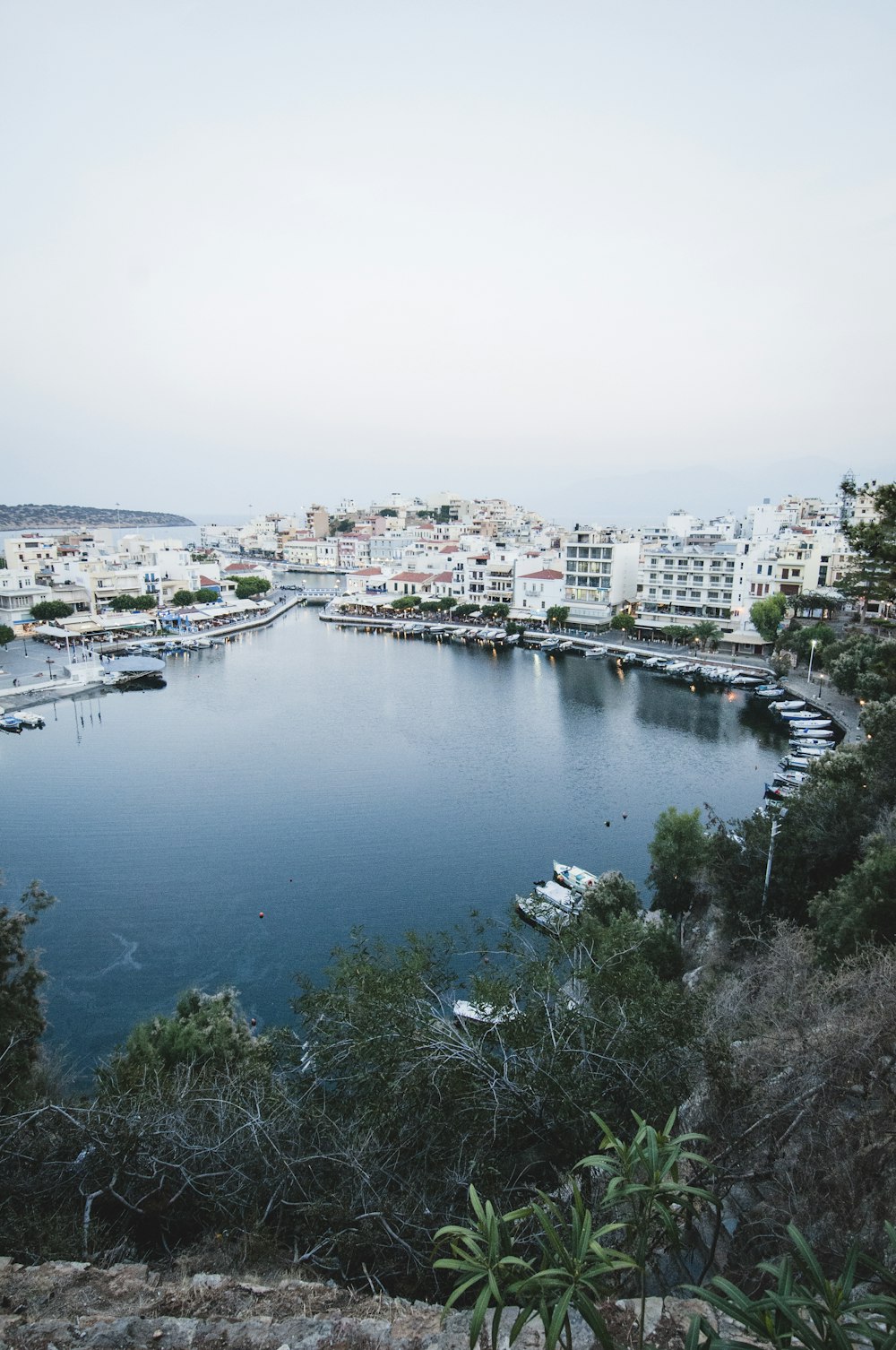 buildings beside lake