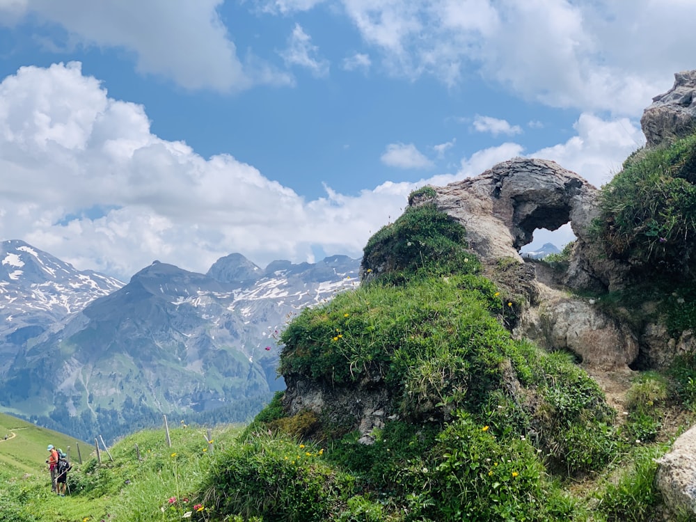 mountains under cloudy sky during daytime